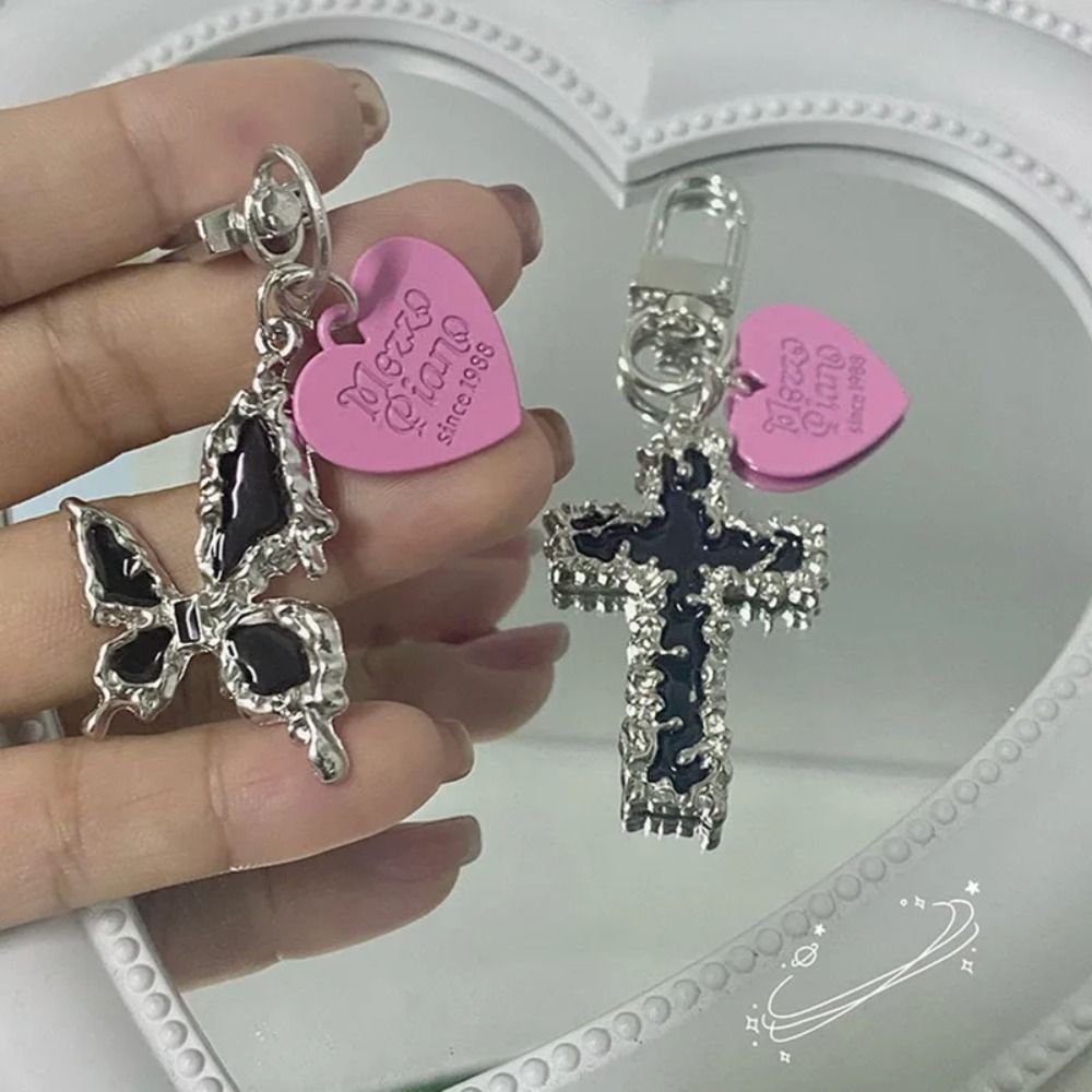 Bag Pendant Butterfly Cross Ke - Tech Girl Accessories recension och pris